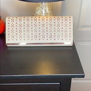Cream and sparkle clutch